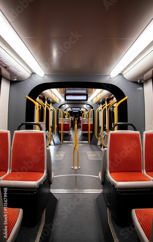 Empty view of the tram with red seats photo
