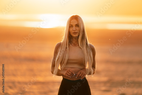 portrait of a blonde girl at sunset