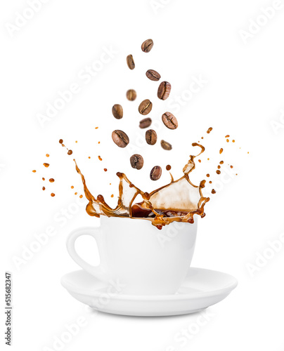 Cup of coffee splash with falling roasted coffee beans