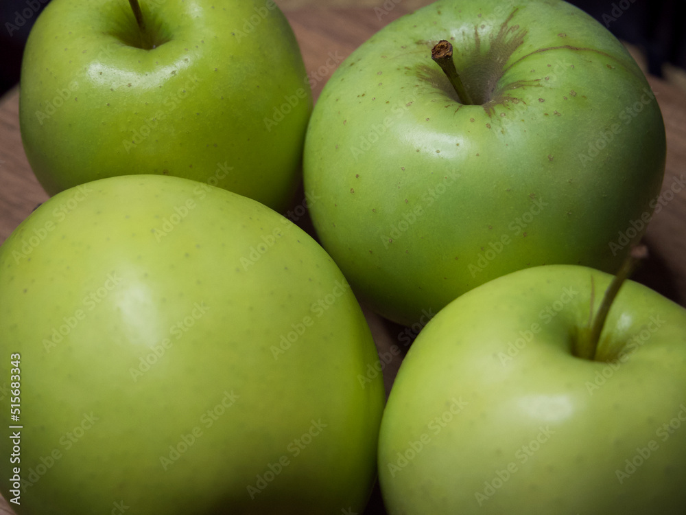 Renet simirenko green apples, top view, close-up. Macro shot of fruit. Renet simirenko green apples, top view, close-up. Macro shot of fruit.