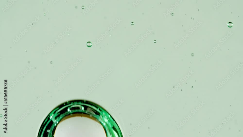 Slow Motion Shot of Moving Air Bubbles. Macro Shot of Various Air Bubbles in Water Rising up on Light White Background. Liquid Cream Gel Transparent Cosmetic Sample Texture With Bubbles. 4k Slow Motion Shot of Moving Air Bubbles. Macro Shot of Various Air Bubbles in Water Rising up on Light White Background. Liquid Cream Gel Transparent Cosmetic Sample Texture With Bubbles. 4k