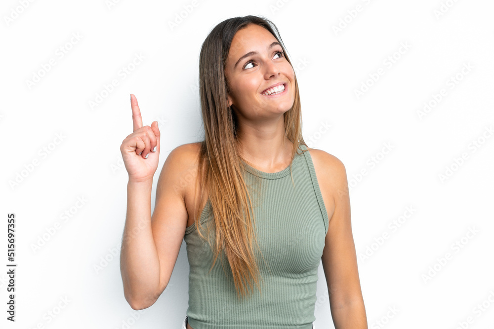 Young caucasian woman isolated on white background intending to realizes the solution while lifting a finger up Young caucasian woman isolated on white background intending to realizes the solution while lifting a finger up
