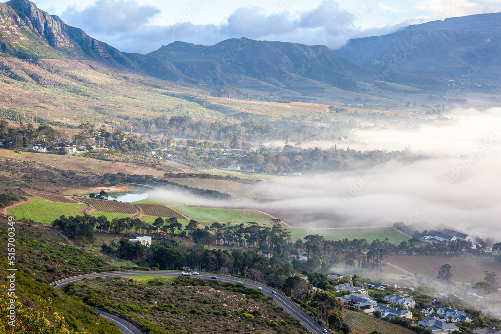The southern suburbs of Cape Town from silvermine, covered in fog down below.