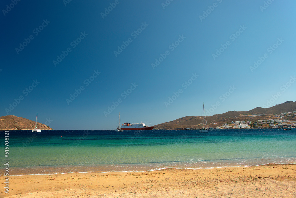 Livadi beach with view over port on Serifos island in Greece