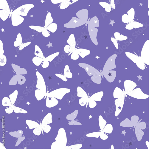 Seamless pattern with silhouettes of butterflies against the starry sky. Vector graphics. © Ирина Горбунова