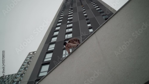 Young businessman using a smartphone outside