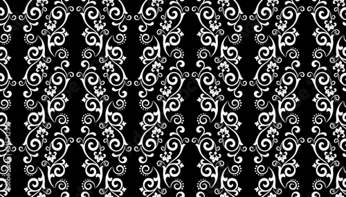 Wallpaper in the style of Baroque. Seamless vector background. White and black floral ornament. Graphic pattern for fabric, wallpaper, packaging. Ornate Damask flower ornament