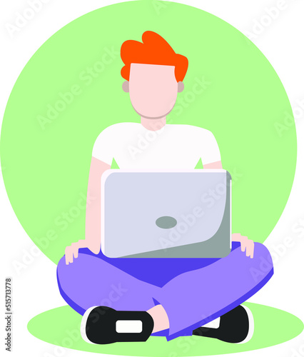 redhead man working on laptop