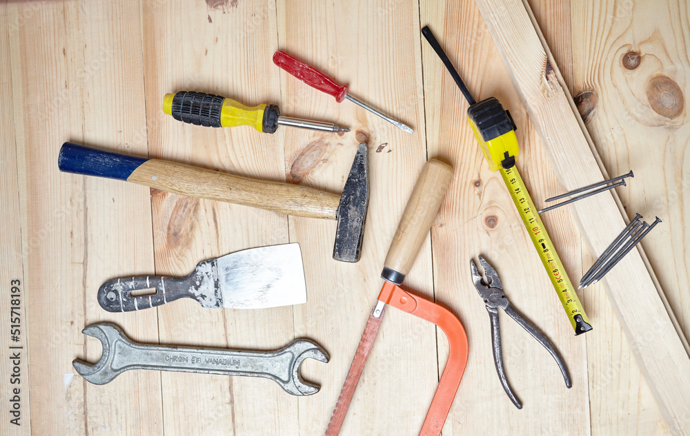 set of tools on the wood background set of tools on the wood background