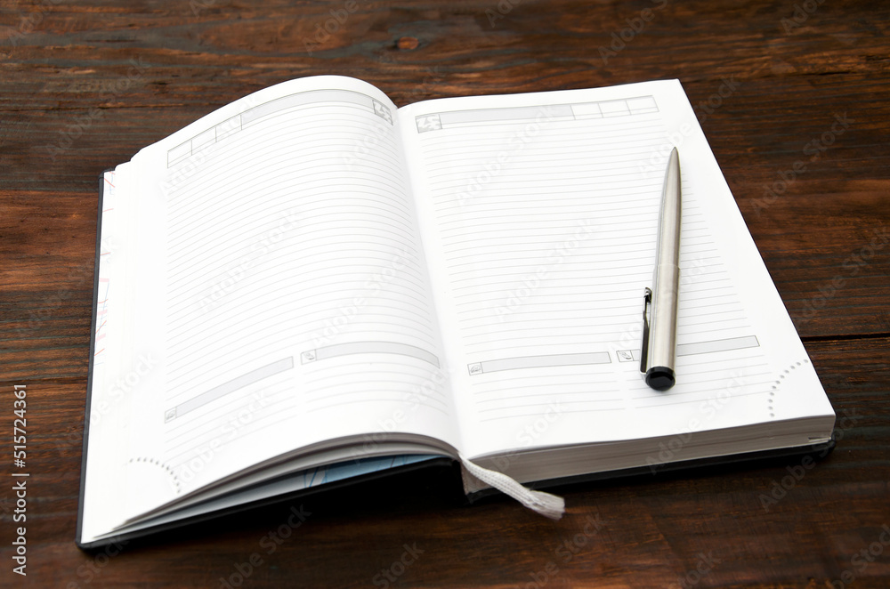 Notebook and pen. To do list. Concept Notebook and pen. To do list. Concept