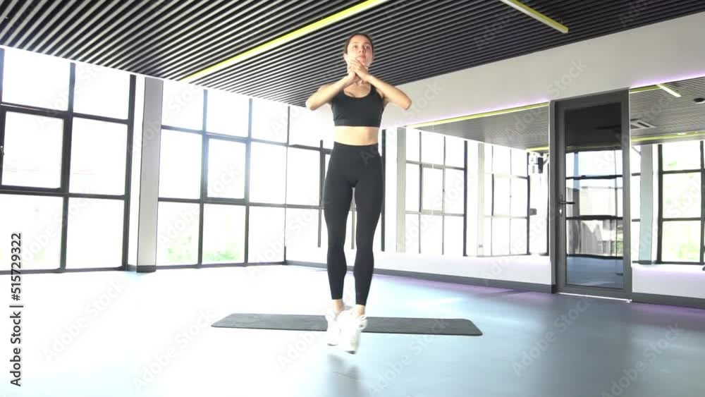 Two happy girls perform sports exercise workout Two happy girls perform sports exercise workout