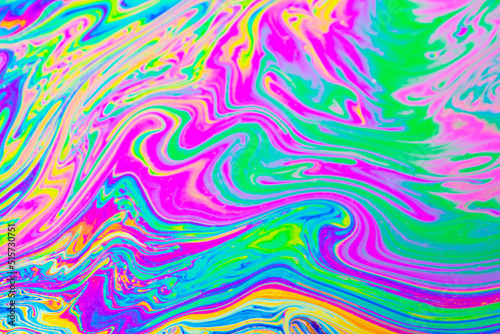 Psychedelic multicolored background abstract. Rainbow colors. patterns background. Photo macro shot of soap bubbles..