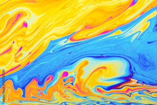Psychedelic multicolored background abstract. Rainbow colors. patterns background. Photo macro shot of soap bubbles..