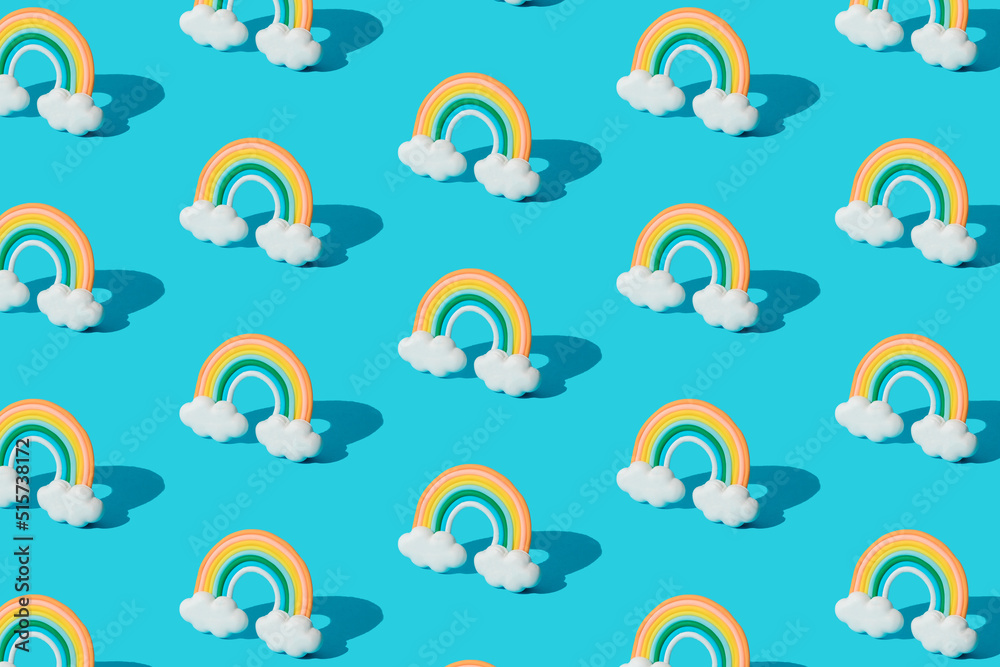 Fototapeta premium Small colorful rainbow cookie with clouds. Pattern.