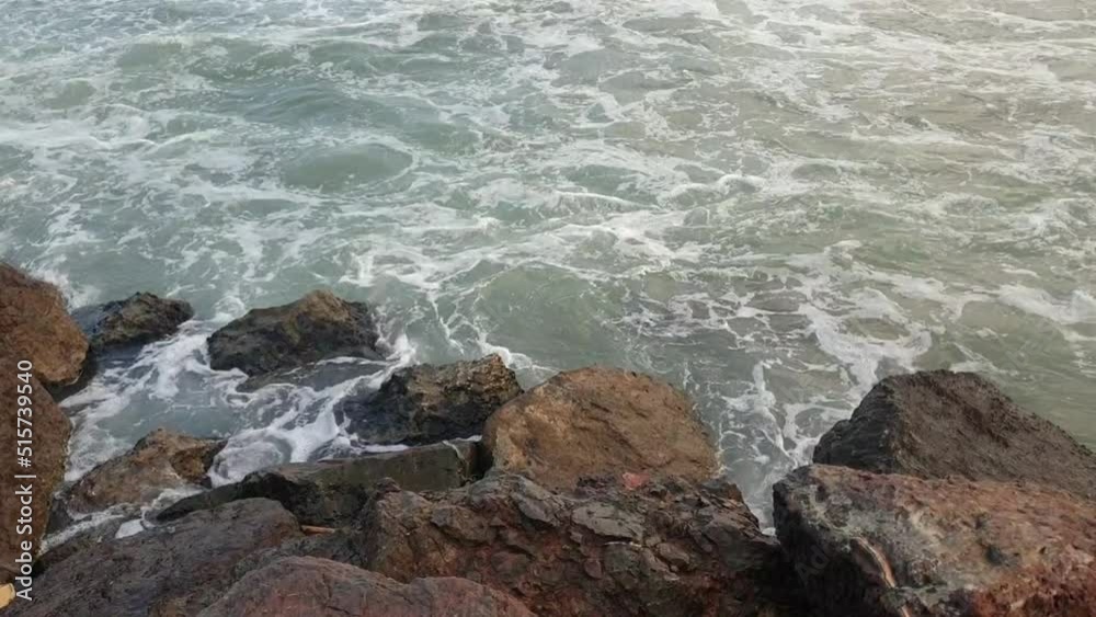 the sea waves are beating against the rocks the sea waves are beating against the rocks