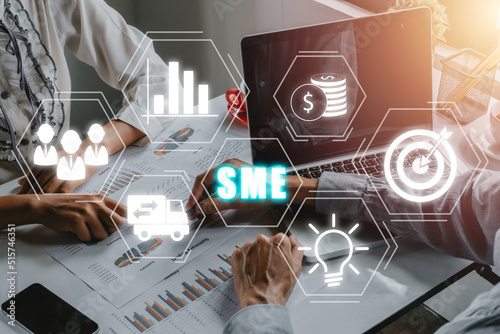 SME, Small and medium-sized enterprises, Business team analyzing income charts and graphs with modern laptop computer, Business model, KEY TO SUCCESS concept.