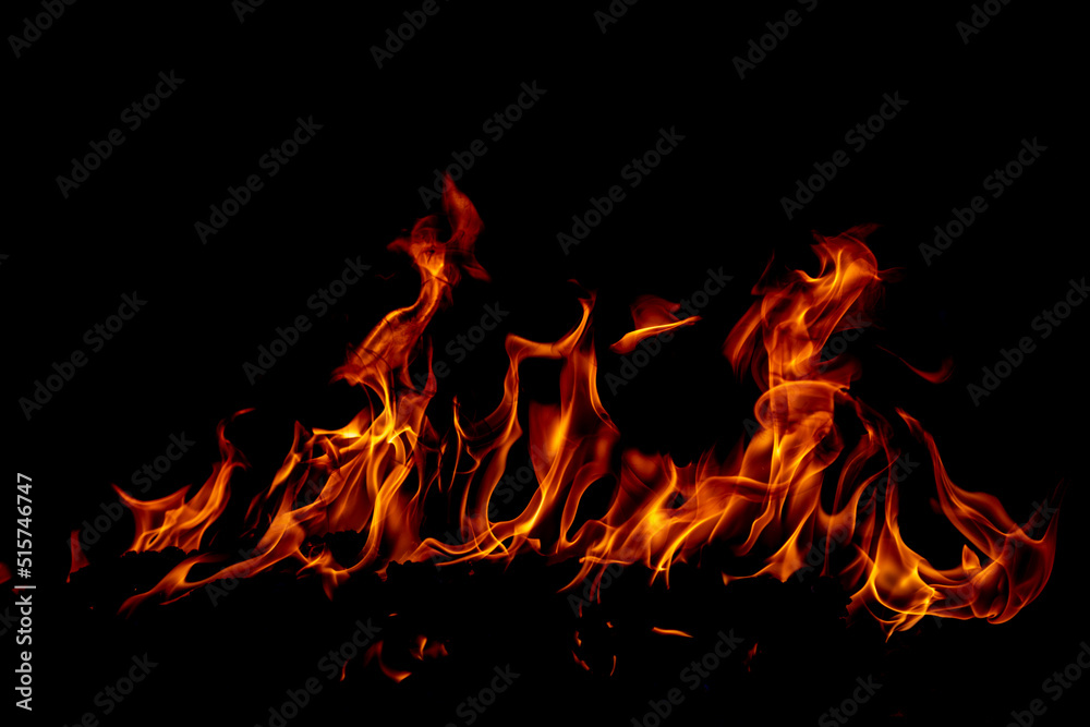 Fire flame. Burn lights on a black background. Fire flame. Burn lights on a black background.
