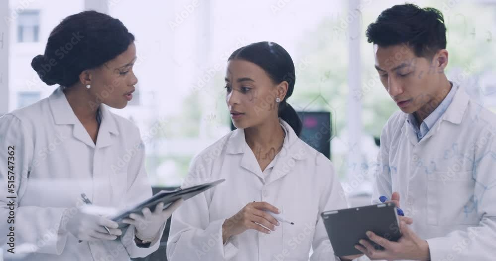 Laboratory scientists using digital tablet while brainstorming and discussing chemical compound changes, reactions in experiment test. Biochemist pathologists working cure discovery to monkeypox