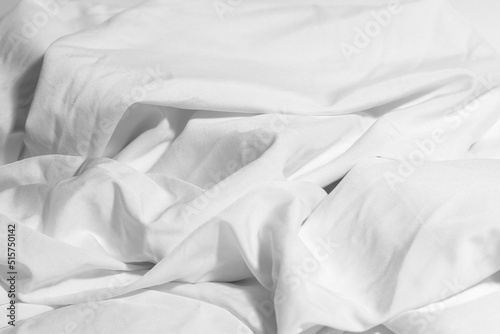 white pillows on the bed