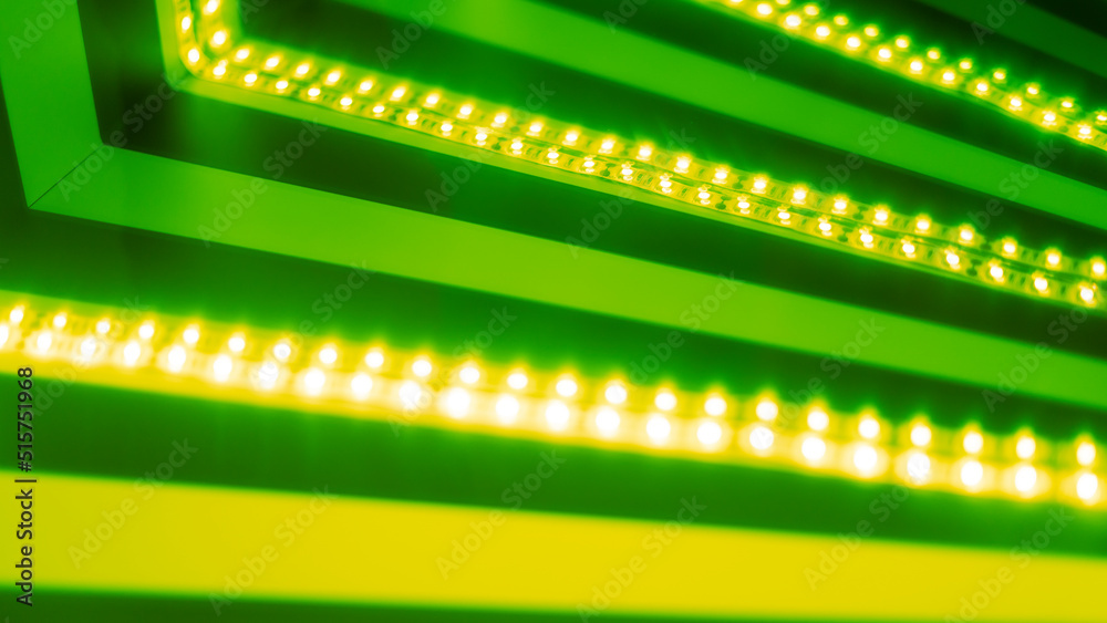 glowing LED stripes in green for background use 