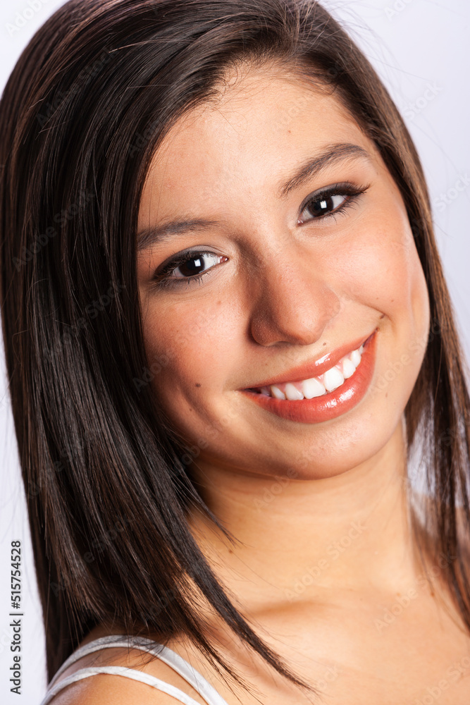 Close-up ortrait of a young teenage girl in a studio Close-up ortrait of a young teenage girl in a studio