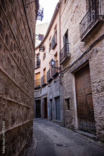 Historical architecture in Toledo town  narrow street in old town Toledo  Spain
