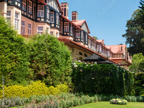 Nuwara Eliya, Sri Lanka - March 10, 2022: View of the Grand Hotel built in the colonial style. The hotel is beautifully landscaped