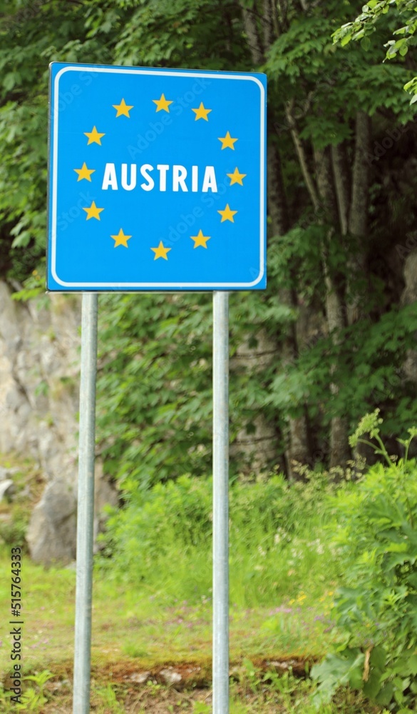 sign with the writing Austria in Italian on the border between the Republic of Austria and Italy in Europe