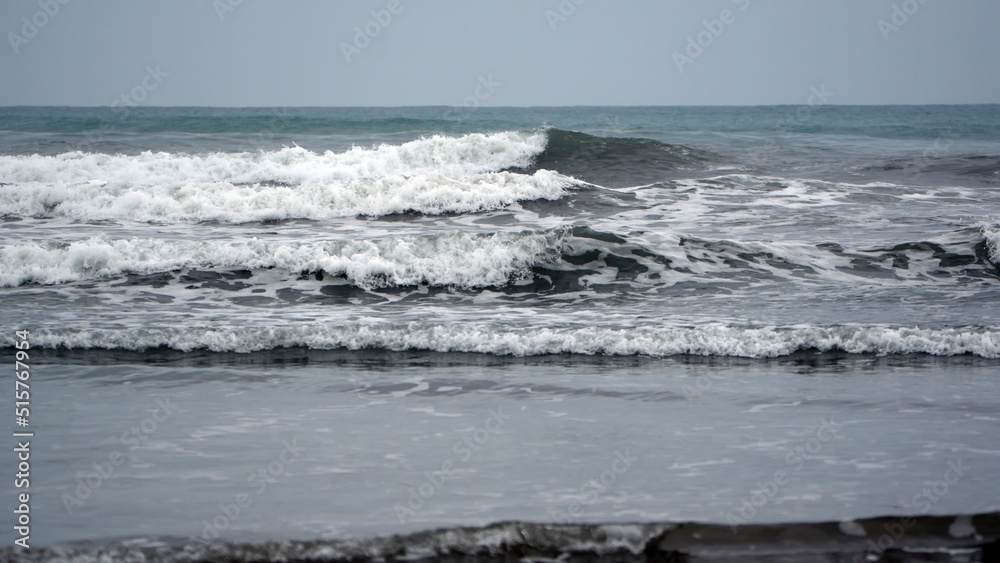 Waves breaking on the beach in Canoa, Ecuador