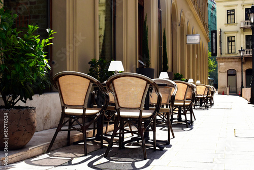 Photography open street or sidewalk terrace of restaurant in European urban setting