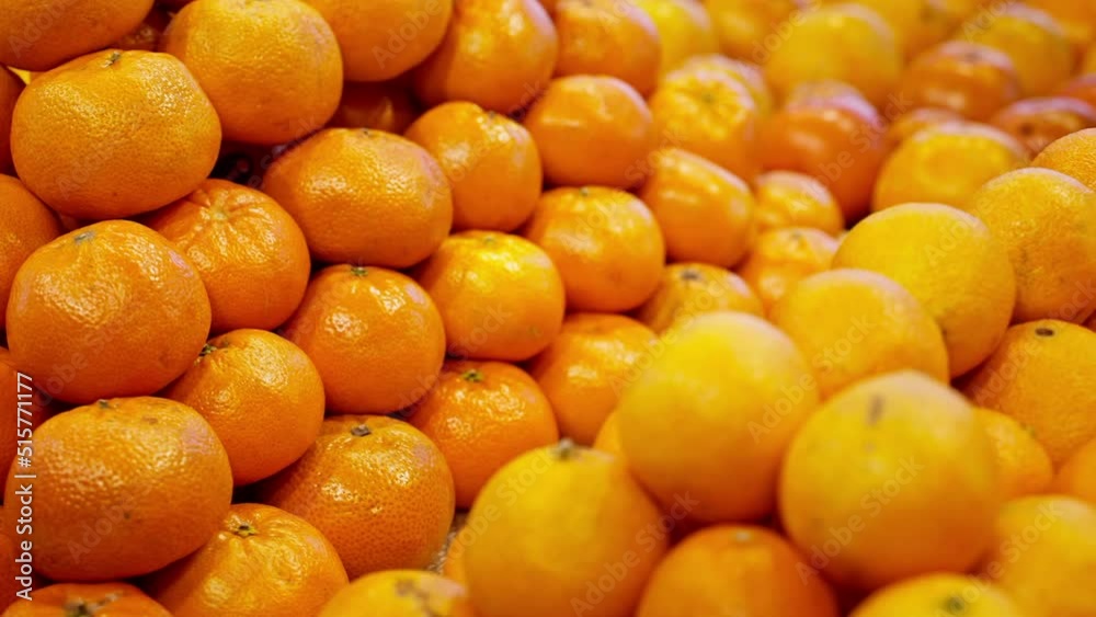 Large amount of tangerines on sale in the grocery Large amount of tangerines on sale in the grocery