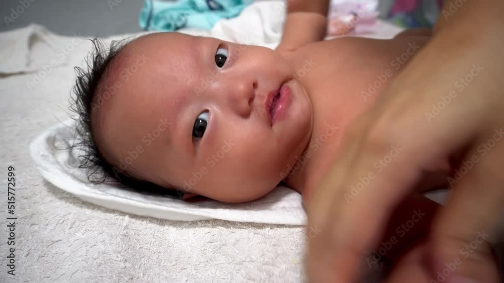 Mother clean and dry the body of baby boy with towel Mother clean and dry the body of baby boy with towel