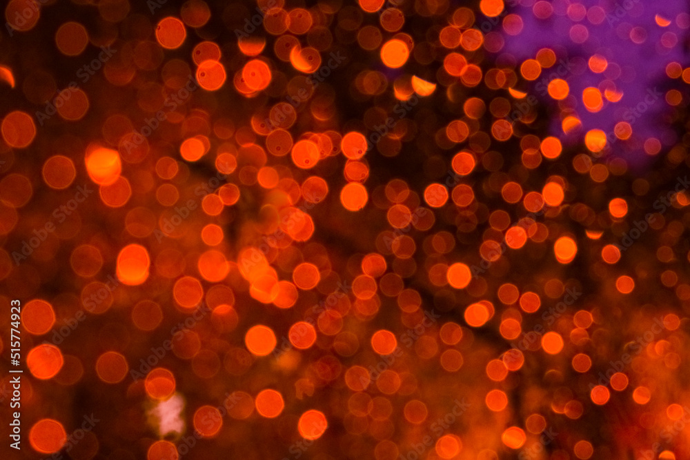 Orange-burgundy highlights, abstract bokeh, red background. Orange-burgundy highlights, abstract bokeh, red background.