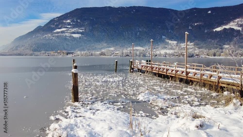 View of a dreamy winter landscape at the lake Ossiacher See in Carinthia, Austria. Blick auf eine verträumte Winterlandschaft am Ossiacher Sees in Kärnten, Österreich photo