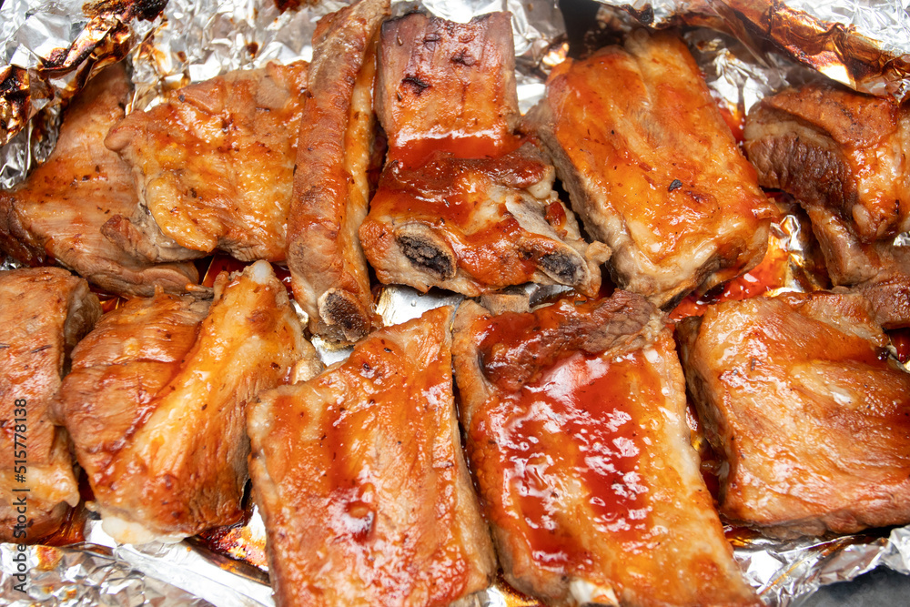 Pork ribs baked in barbecue sauce in the oven