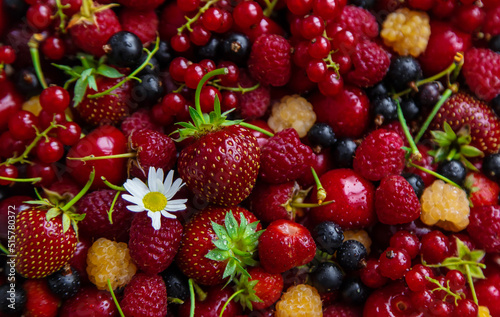 Beautiful background with homemade berries. Selective focus.