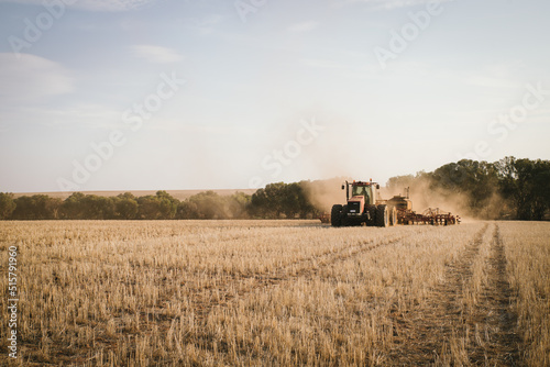 Dry seeding crop into stubble in paddock in the Avon Valley of Western Australia photo