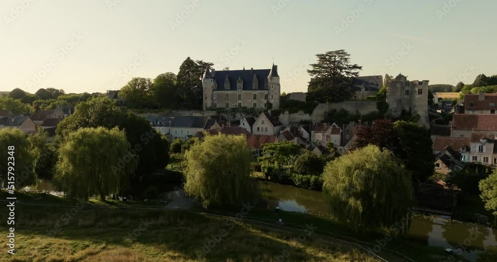 Aerial view of the castle of Montrésor during sunset in France. Aerial view of the castle of Montrésor during sunset in France.