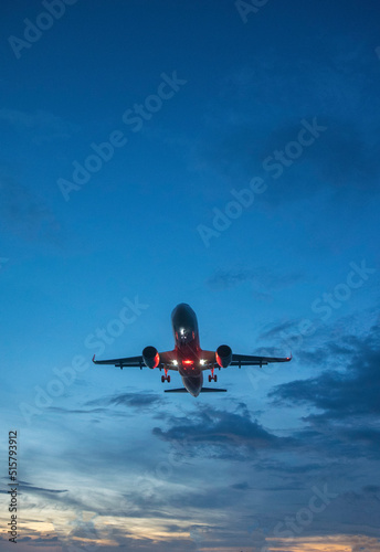 airplane with color sky in sunset time