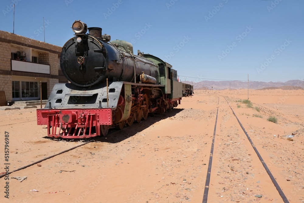 Obraz premium Hijab railway locomotive at a railway station in the Jordanian desert. Jordan