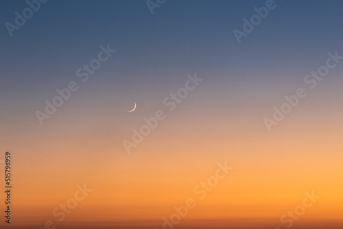 Print op canvas Sunset on clear sky with moon and the star.