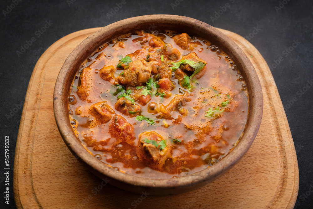 Georgian national dish Ojakhuri, in a clay plate Georgian national dish Ojakhuri, in a clay plate