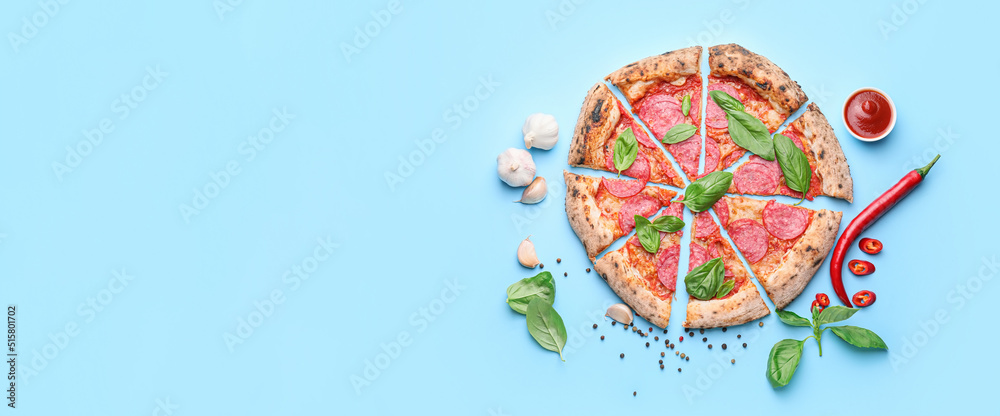 Tasty pepperoni pizza on light blue background with space for text