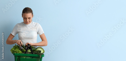 Young woman holding shoppin...