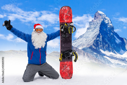 Fotografie Santa Claus on a snowboard