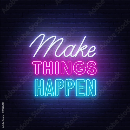 Make Things Happen neon quote on a brick wall.