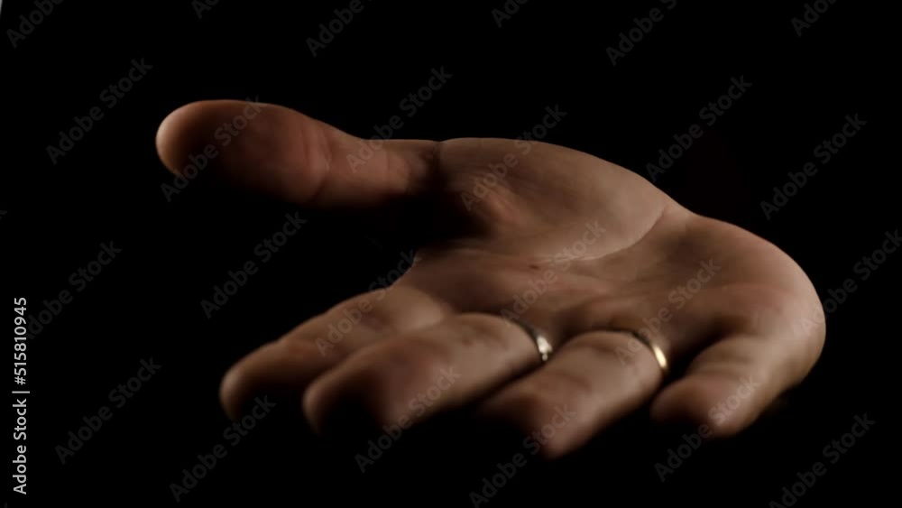 the appearance of a hand on a black background shows gestures and disappears the appearance of a hand on a black background shows gestures and disappears