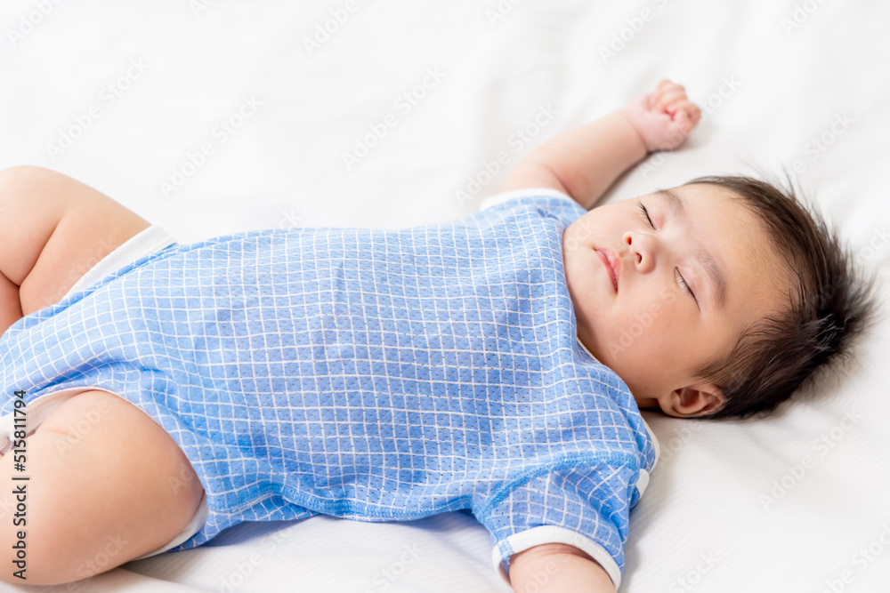 baby sleeping on the bed baby sleeping on the bed