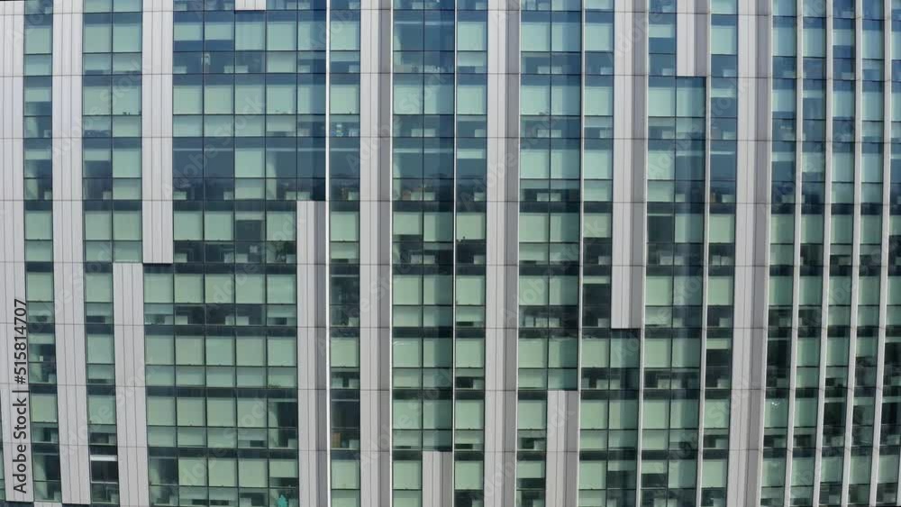 Facade of a glass building. There are many offices. Facade of a glass building. There are many offices.