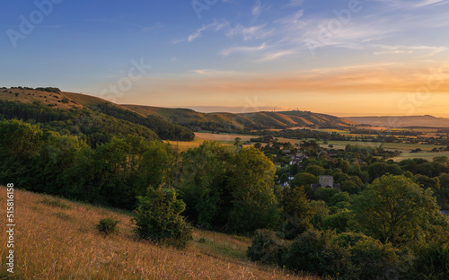 Beautiful views west over the village of Poynings from Devils Dyke to Chanctonbury ring on the south downs in west Sussex south east England UK